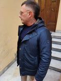 PARKA LUNGO CON CAPPUCCIO TESSUTO GOMMATO MARKUP