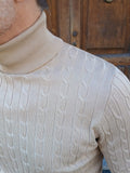 MAGLIA COLLO ALTO CON TRECCE MARKUP