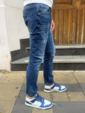JEANS DENIM BLU CON EFFETTO USURATO E DETTAGLI DISTRESSED TELAMIRA