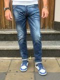 JEANS DENIM BLU CON DETTAGLI DISTRESSED TELAMIRA