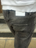 JEANS NERO CON STRAPPI TELAMIRA