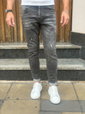 JEANS NERO CON STRAPPI TELAMIRA