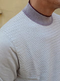 MAGLIA LUPETTO CON LAVORAZIONE A INTARSIO MARKUP