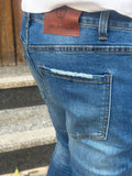 JEANS DENIM CHIARO CON LAVAGGIO SFUMATO TELAMIRA