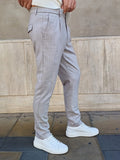PANTALONE CON UNA PENCE ED ELASTICI LATERALI TELAMIRA